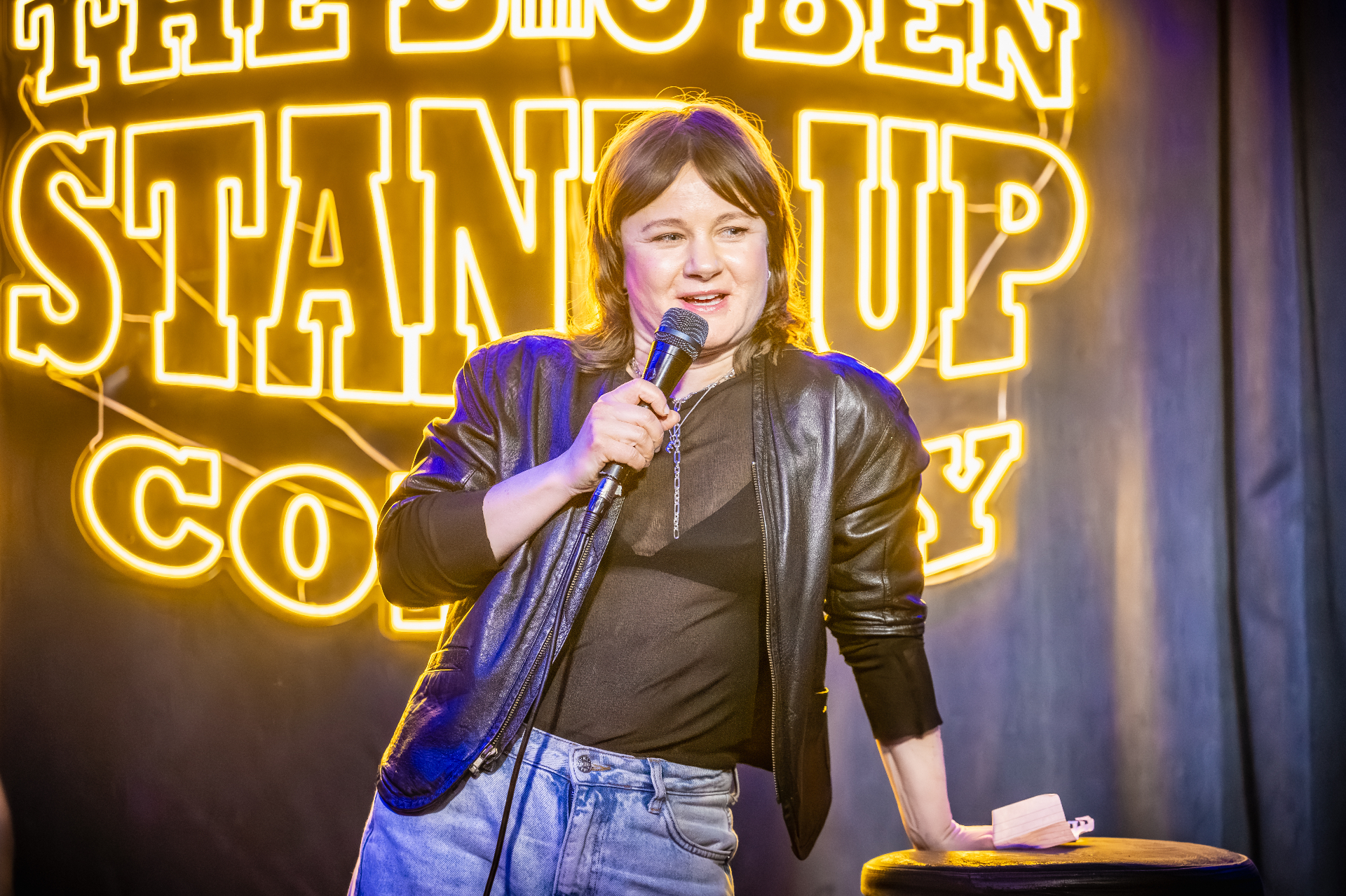 Ebba Rosencrantz on stage with neon sign
